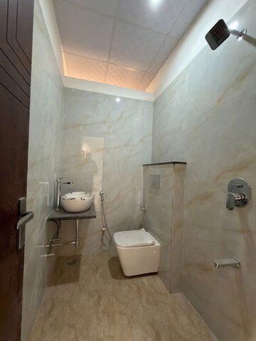 Bathroom in 3 BHK Apartment at Affinity Greens, International Airport Road – for Rent