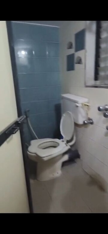 Bathroom in 2 BHK Apartment at Divya Smruthi, Malad West – for Rent