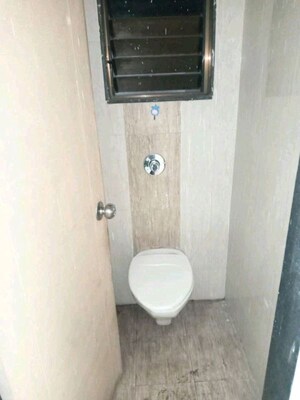 Bathroom in 1.5 BHK Apartment at RC Orchid Apartments, Ghansoli – for Rent