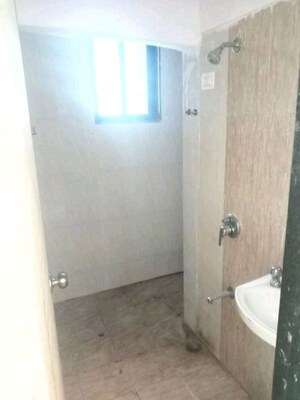 Bathroom in 1.5 BHK Apartment at RC Orchid Apartments, Ghansoli – for Rent