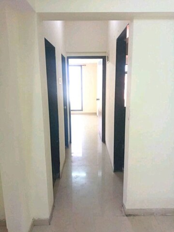 Building Lobby in 1.5 BHK Apartment at RC Orchid Apartments, Ghansoli – for Rent