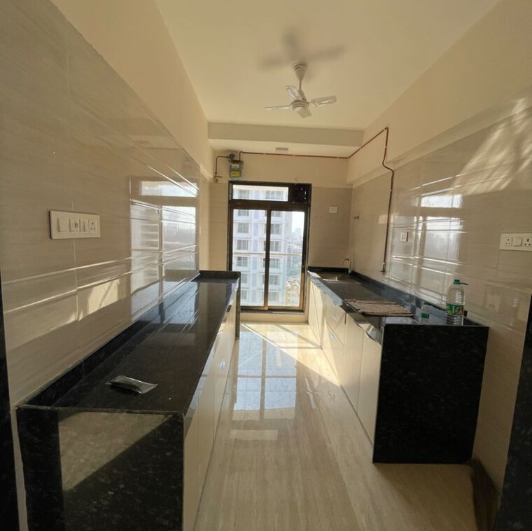 Kitchen, je-and-vee-om-trimurti 1 Bedroom 395 Sq.Ft. Apartment In Dindoshi Mumbai 9917786