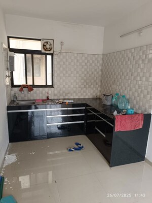 Kitchen in 2 BHK Apartment at Kolte Patil Margosa Heights, Mohammadwadi – for Rent
