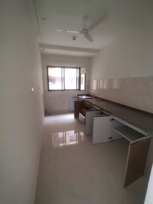 Kitchen in 2 BHK Apartment at Kumar Palmspring Towers, Undri – for Rent