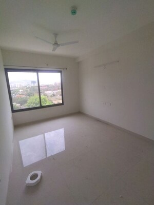 Bedroom in 2 BHK Apartment at Kumar Palmspring Towers, Undri – for Rent