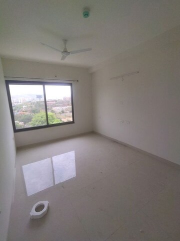 Bedroom in 2 BHK Apartment at Kumar Palmspring Towers, Undri – for Rent