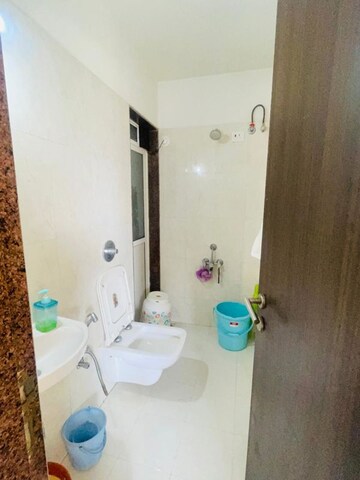 Bathroom in 1 BHK Apartment at Puranik Hometown, Ghodbunder Road – for Rent