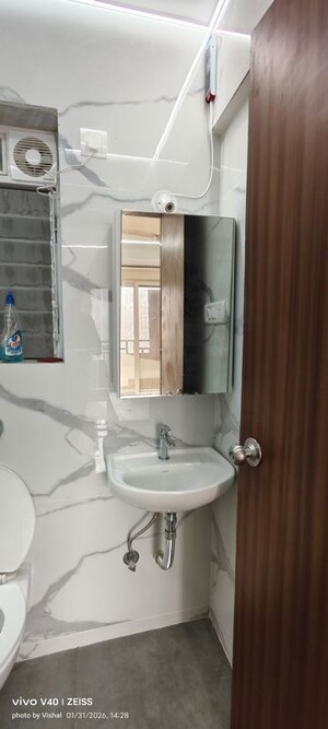 Bathroom in 1 BHK Apartment at Raunak Bliss, Ghodbunder Road – for Rent