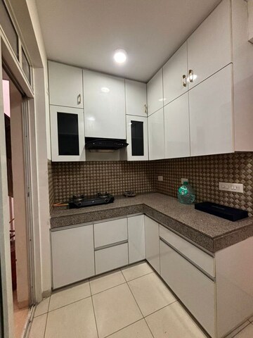 Kitchen in 3.5 BHK Apartment at Experion The Heart Song, Sector 108 – for Rent