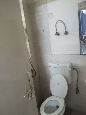 Bathroom in 1 BHK Apartment at Auric City Homes, Sector 82 – for Rent