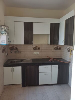 Kitchen in 2 BHK Apartment at Urbtech Xaviers, Sector 168 – for Rent