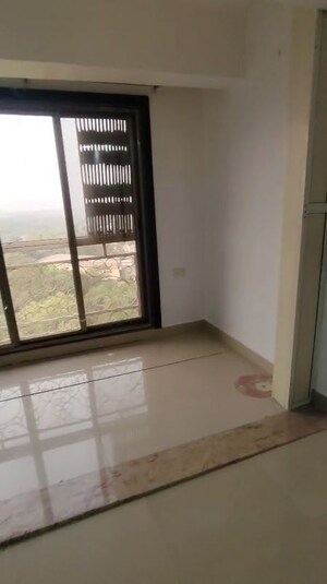 Room in 2 BHK Apartment at Madhav Palacia, Ghodbunder Road – for Rent