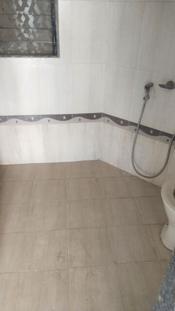 Bathroom in 3 BHK Apartment at Happy Home CHS, Kharghar – for Sale