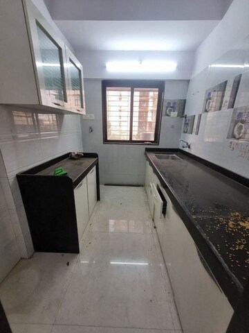 Kitchen in 1 BHK Apartment at Anand CHS Matunga, Matunga East – for Rent