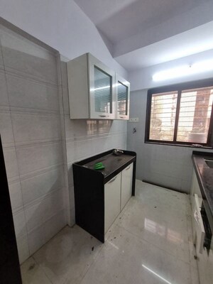 Kitchen in 1 BHK Apartment at Anand CHS Matunga, Matunga East – for Rent