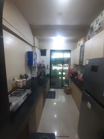 Kitchen in 2 BHK Apartment at Jalan Aura County Pune, Wagholi – for Rent