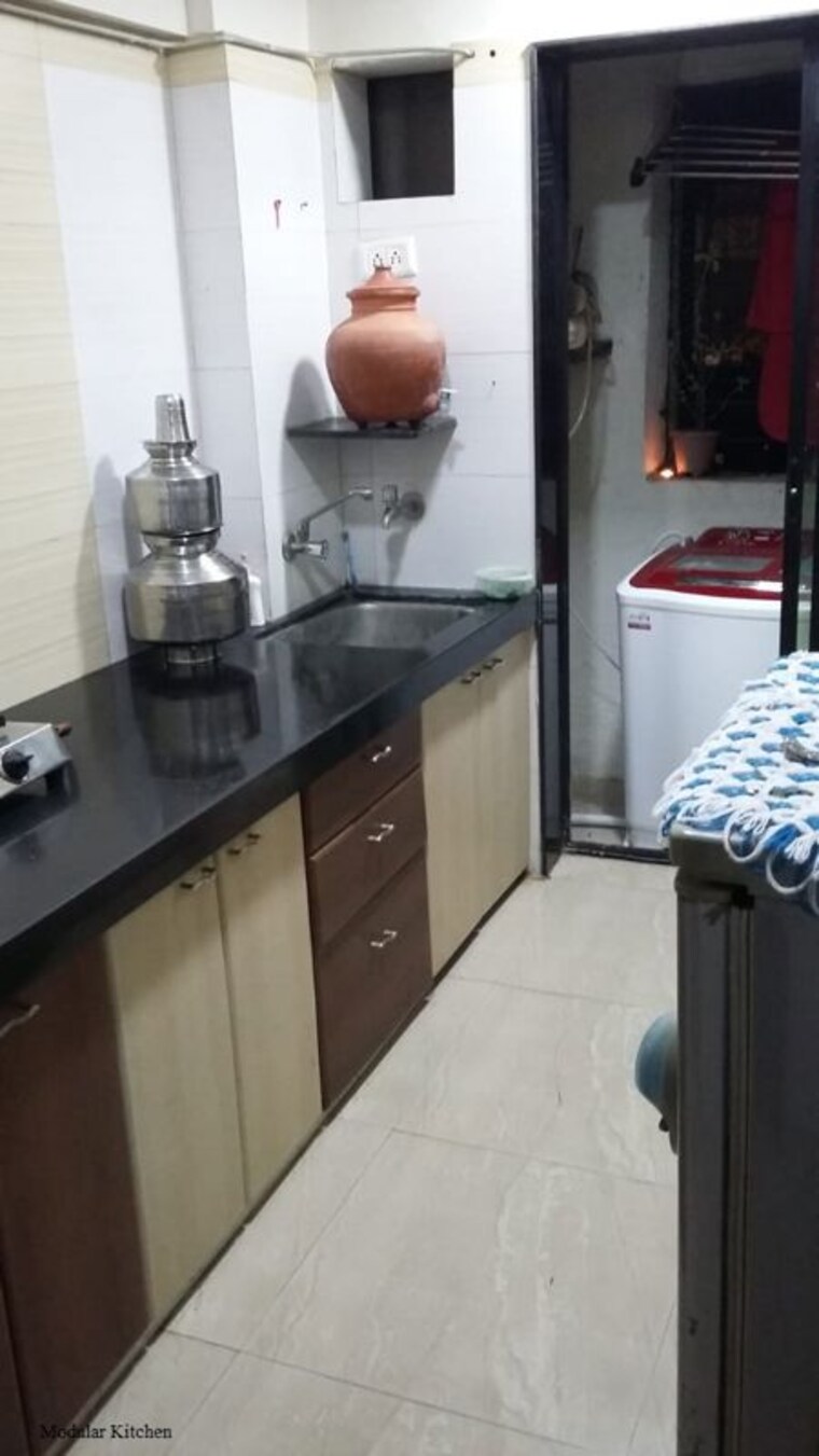 Kitchen, jalan-aura-county-pune 2 Bedroom 1078 Sq.Ft. Apartment In Wagholi Pune 9918569