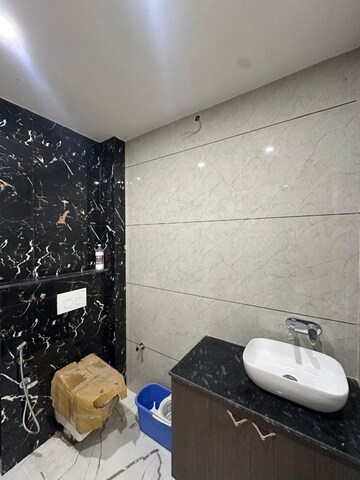 Bathroom in 4 BHK Apartment at Avantika Colony – for Sale