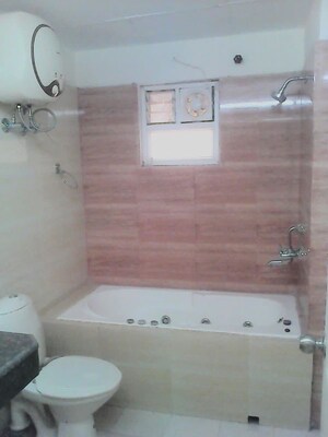 Bathroom in 3 BHK Apartment at Rohtas Plumeria, Gomti Nagar – for Rent
