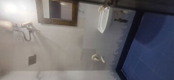 Bathroom in 2 BHK Apartment at HDIL Dheeraj Diamond, Malad West – for Rent