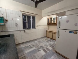 Kitchen in 2 BHK Apartment at Evershine CHS Malad, Malad West – for Rent