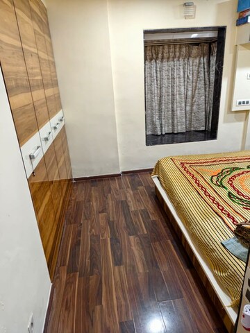 Bedroom in 2 BHK Apartment at Dheeraj Ganga, Malad West – for Rent