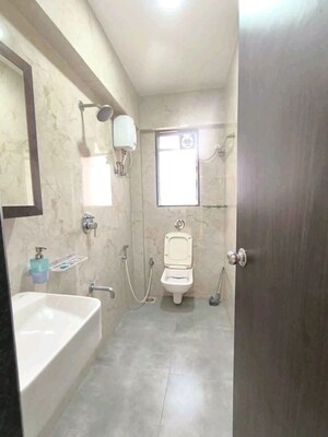 Bathroom in 2 BHK Apartment at Ani Anu Sri Balaji Enclave, Malad West – for Rent
