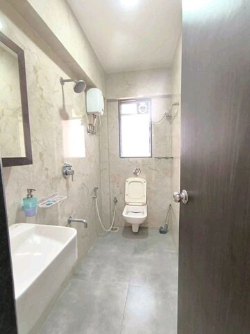 Bathroom in 2 BHK Apartment at Ani Anu Sri Balaji Enclave, Malad West – for Rent