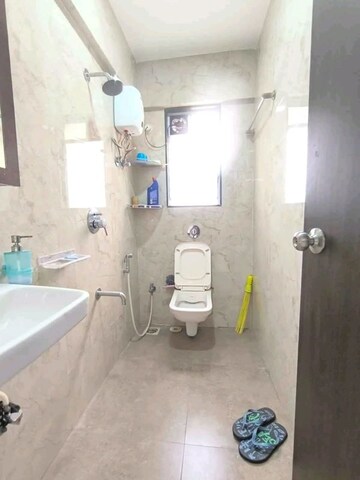Bathroom in 2 BHK Apartment at Ani Anu Sri Balaji Enclave, Malad West – for Rent