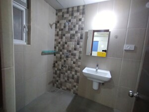 Bathroom in 3 BHK Apartment at Aparna Sarovar, Nallagandla – for Rent