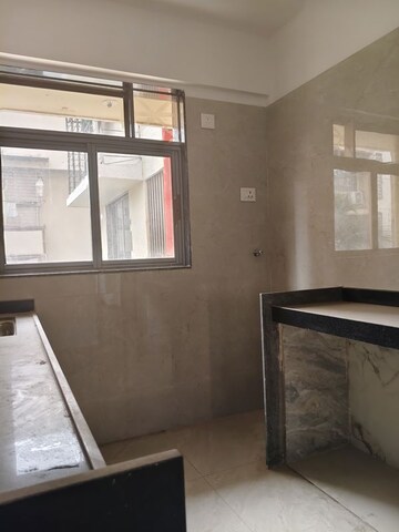 Kitchen in 1 BHK Apartment at Madhuban Avenue CHS, Goregaon West – for Sale