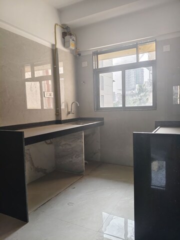 Kitchen in 1 BHK Apartment at Madhuban Avenue CHS, Goregaon West – for Sale