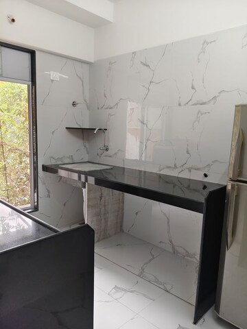 Kitchen in 1 BHK Apartment at Imperial Hava Hira, Malad West – for Sale