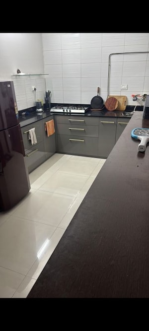 Kitchen in 2 BHK Apartment at Windwards CHS, Wakad – for Sale