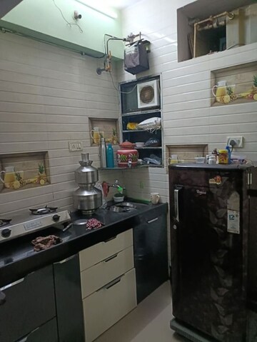 Kitchen in 1 RK Apartment at Shivbhumi CHS, Jogeshwari East – for Sale