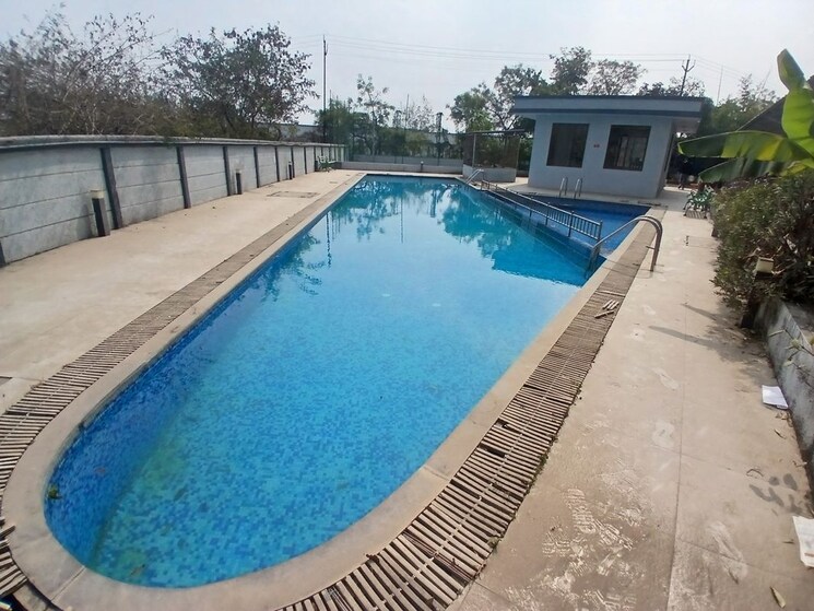 Swimming Pool, global-e-homes 3 Bedroom 1500 Sq.Ft. Apartment In Hinjewadi Pune 9918839