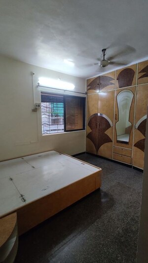 Living Room in 2 BHK Apartment at Malad SC CHS, Malad West – for Rent