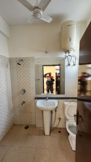 Bathroom in 3 BHK Apartment at Ansal Housing Woodbury, Patiala Road – for Rent