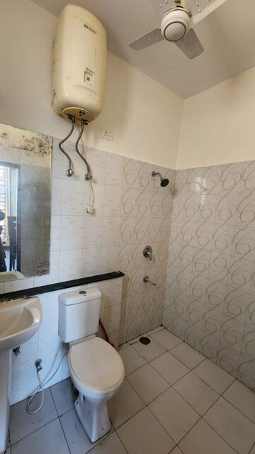 Bathroom in 3 BHK Apartment at Ansal Housing Woodbury, Patiala Road – for Rent