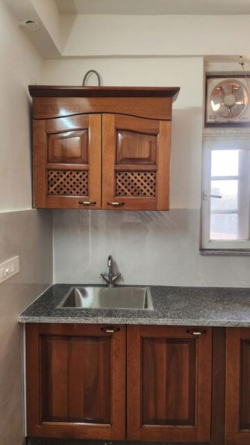 Kitchen in 3 BHK Apartment at Ansal Housing Woodbury, Patiala Road – for Rent