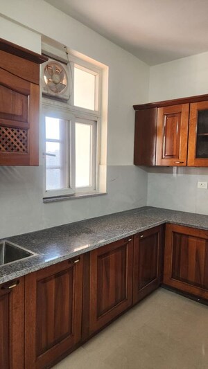 Kitchen in 3 BHK Apartment at Ansal Housing Woodbury, Patiala Road – for Rent