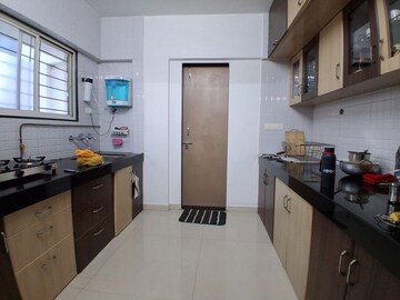 Kitchen in 2 BHK Apartment at Sun City – for Sale
