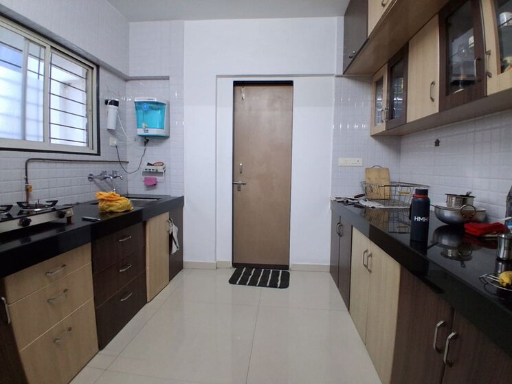 Kitchen, sun city 2 Bedroom 1132 Sq.Ft. Apartment In Sun City Pune 9919144