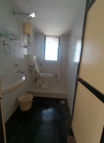 Bathroom in 2 BHK Apartment at Atul Blue Horizon II, Malad West – for Sale