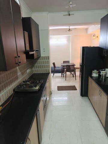 Kitchen in 3 BHK Apartment at Amrapali Crystal Homes, Sector 76 – for Rent