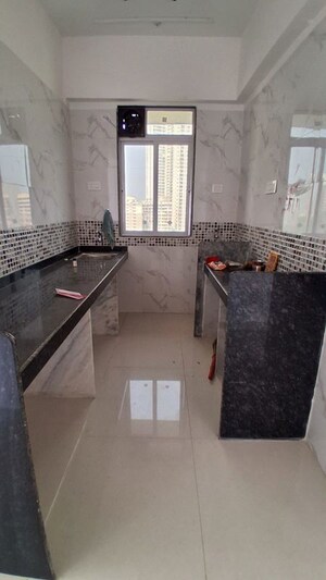 Kitchen in 2 BHK Apartment at DGS Sheetal Tapovan, Malad East – for Rent