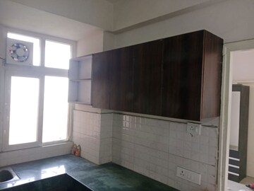 Kitchen in 1 BHK Apartment at Shree Vardhman Green Court, Sector 90 – for Rent