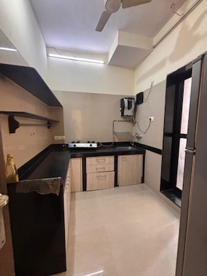 Kitchen in 1 BHK Apartment at K Raheja Raheja Residency, Malad East – for Rent