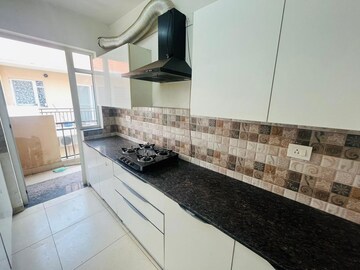 Kitchen in 3 BHK Apartment at Maya Garden City, Lohgarh – for Sale