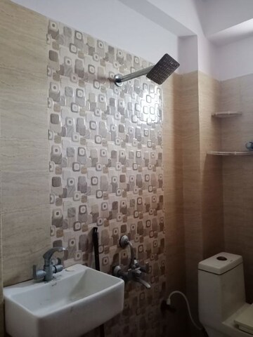 Bathroom in 2 BHK Apartment at Gardenia Golf City, Sector 75 – for Rent